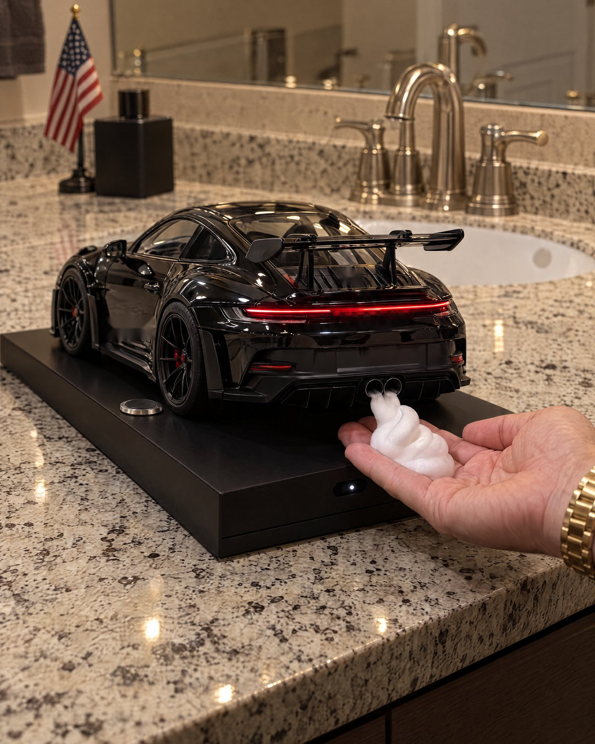 Foam coming out of the exhausts into a hand
