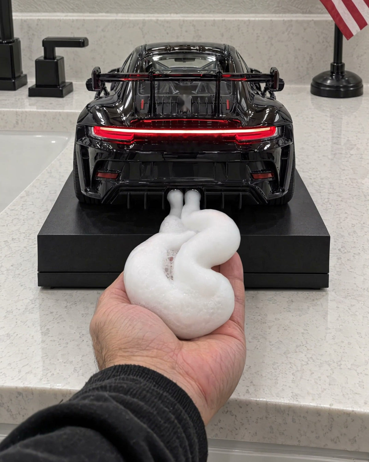 Soft foam from the exhausts in a hand